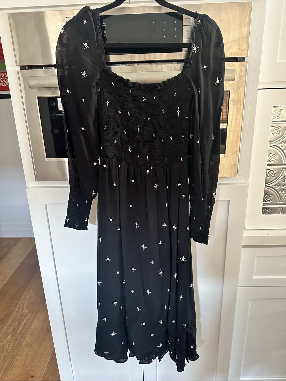 Reformation womens Black Midi Dress with White Star Print size small